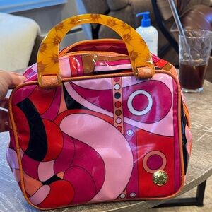 Vibrant Pink and Red Patterned Cosmetic Bag